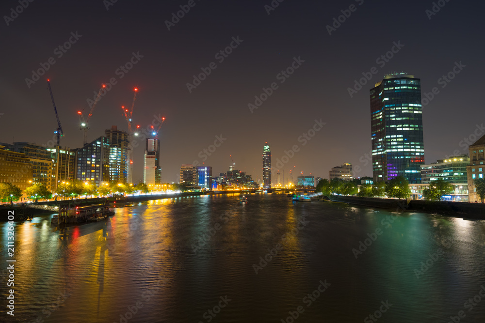 Nigh panorama of London Thames riverside viewed from Lamberth bridge 
