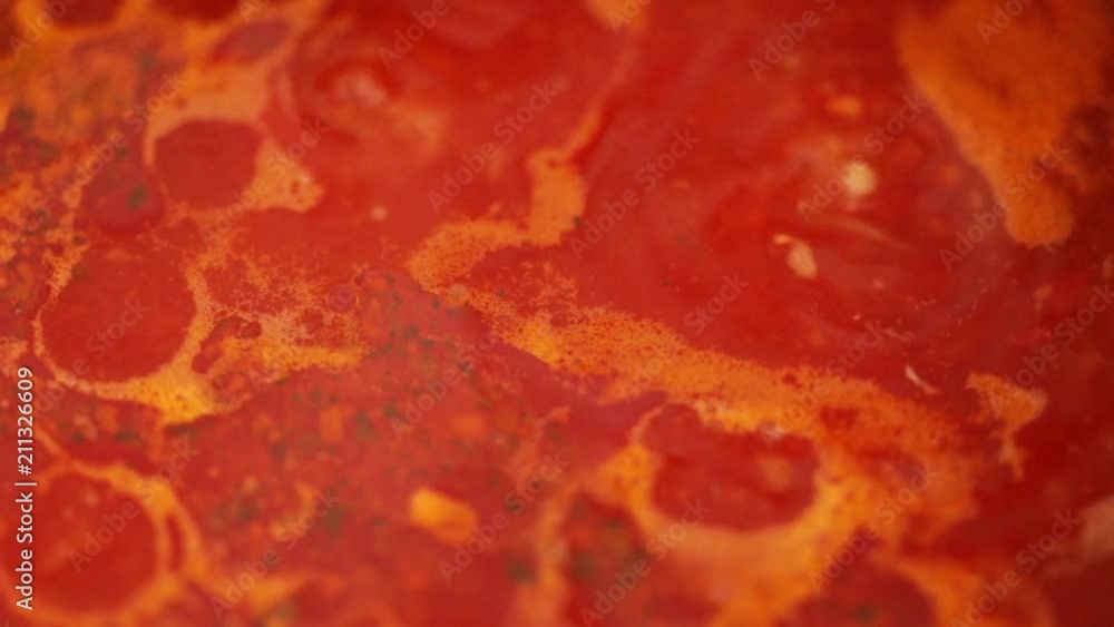 Tomato salsa making, blend boiling in pot, steadicam close-up, slow motion, no people Tomato salsa making, blend boiling in pot, steadicam close-up, slow motion, no people