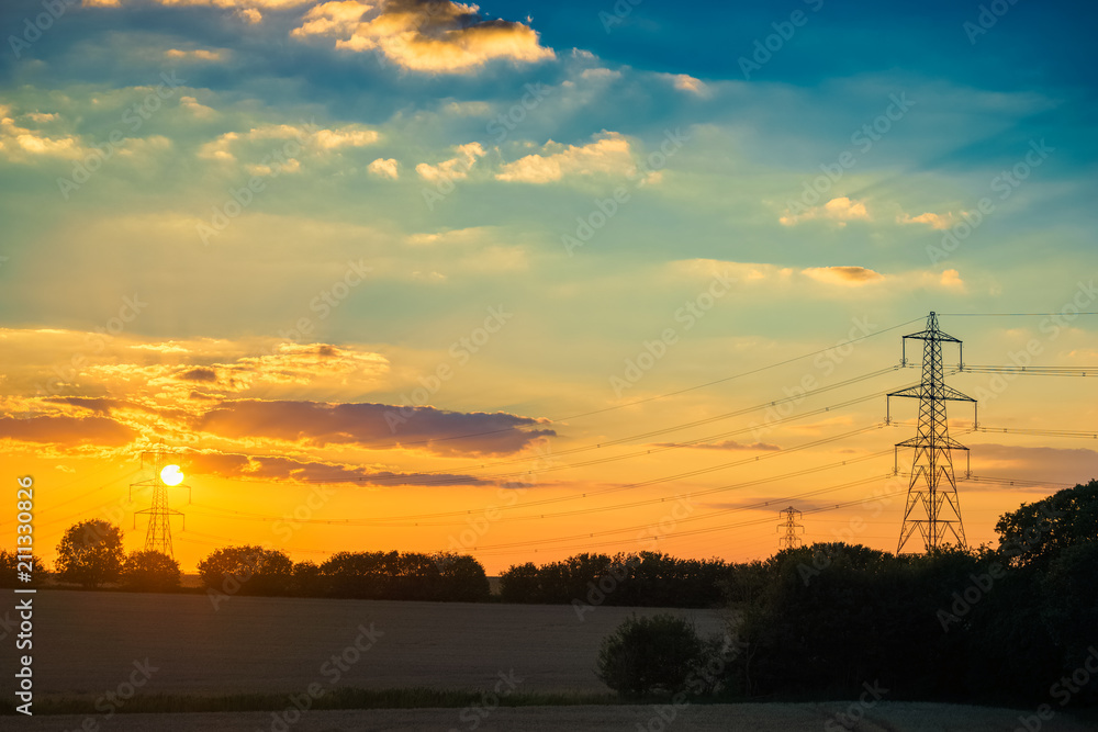 Electric towers at colorful sunset 