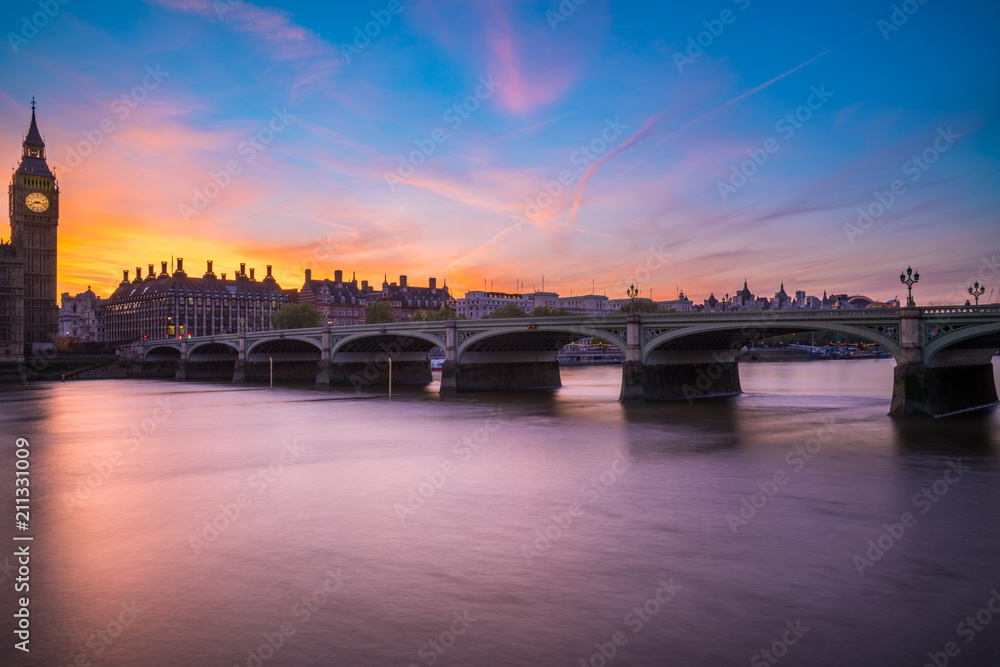 Westminster bridge and Big Ben at sunset in London, England