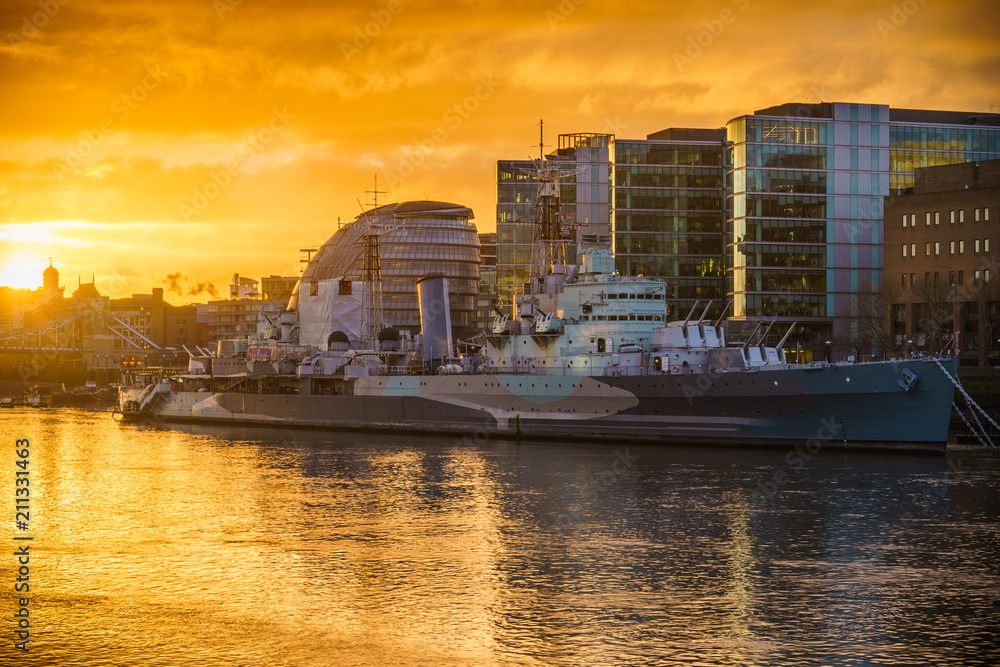 Belfast warship in London at sunrise