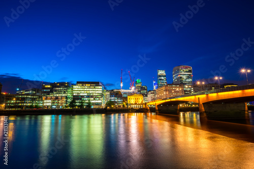 London bridge and Financial District of London at dusk