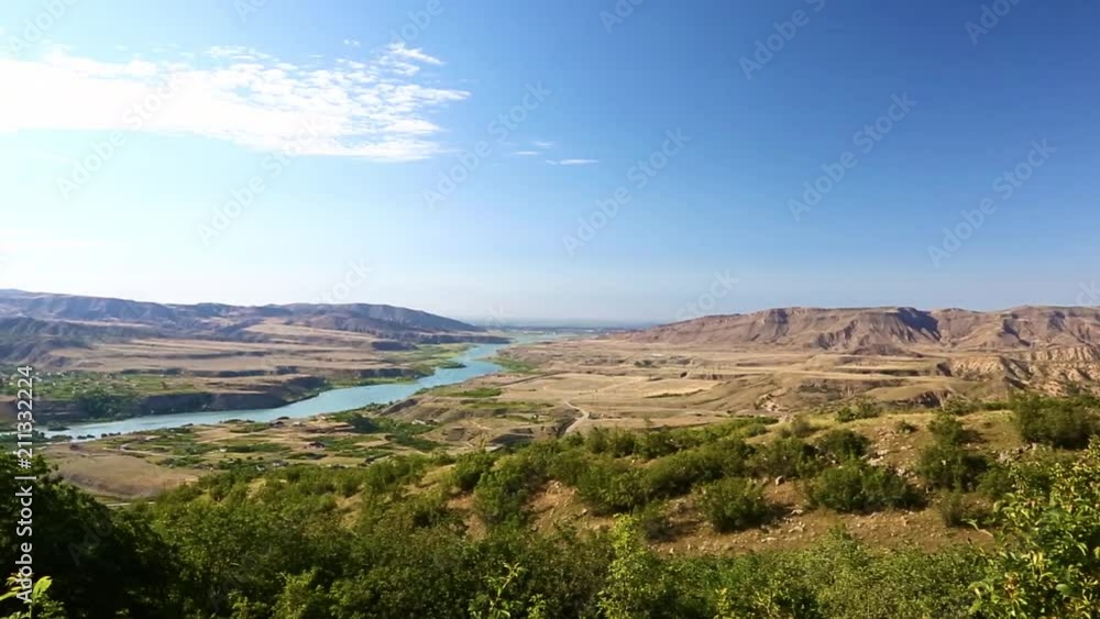 Mountain landscape. A beautiful view of the picturesque gorge, a panorama with high mountains. The nature of the North Caucasus, rest in mountains Mountain landscape. A beautiful view of the picturesque gorge, a panorama with high mountains. The nature of the North Caucasus, rest in mountains