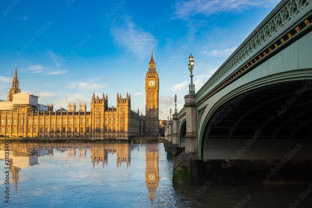 Naklejka premium Big Ben and wesminster bridge at sunrise in London