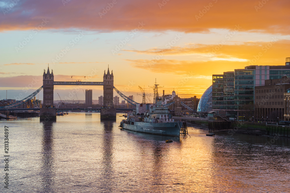 Tower Bridge with colorful sunrise sky in London, England