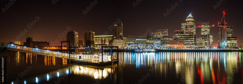 Panorama of Canary Wharf business district at night