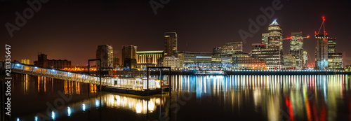 Panorama of Canary Wharf business district at night