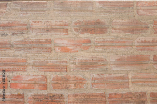 The surface markings of a brick wall blocks.