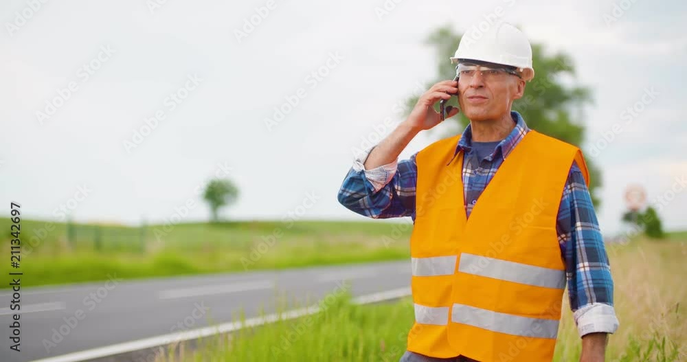 Engineer Analyzing Traffic, polution, On Clipboard Amidst Crops At Farm Engineer Analyzing Traffic, polution, On Clipboard Amidst Crops At Farm