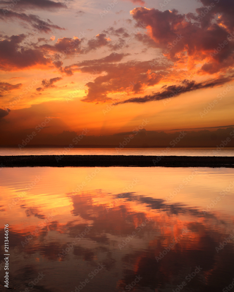 Obraz premium sunset over the river