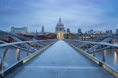  Millennium bridge and St.Paul's cathedral viewed at sunrise in London, England