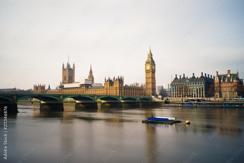 Naklejka premium Big Ben and Westminster parliament viewed across river Thames