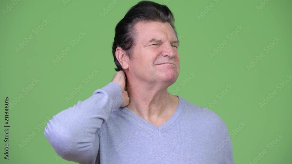 Senior handsome man having neck pain Senior handsome man having neck pain