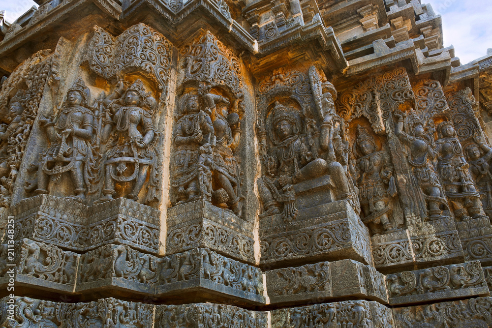 Ornate wall panel reliefs depicting Hindu deities, west side, Hoysaleshwara temple, Halebidu, Karnataka