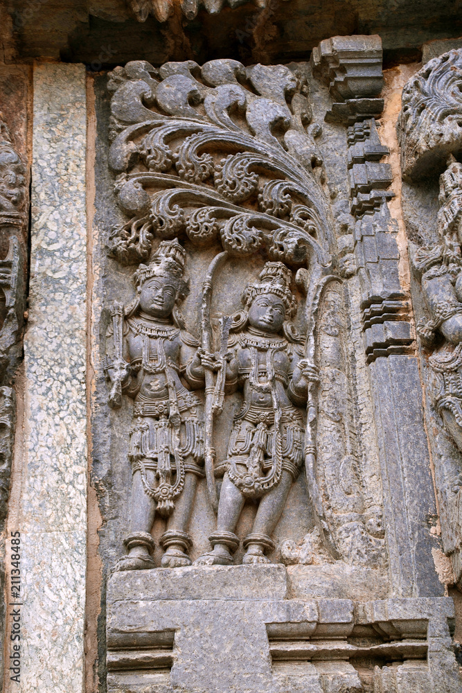 Ornate wall panel reliefs depicting Kamdev and his wife Rati ...