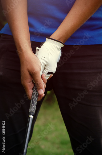 Photography Golfers are holding golf clubs