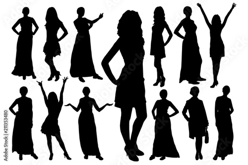 Set of silhouettes of beautiful model girls in different poses. Vector