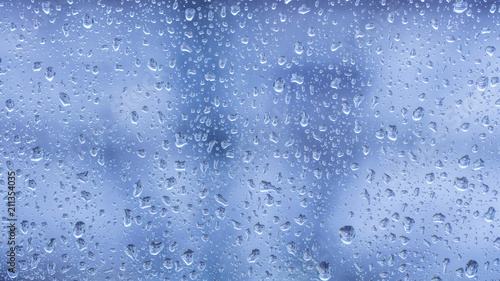 rainy days ,rain drops on the window surface © babaroga