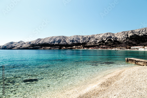 The bay of Baska in a sunny day