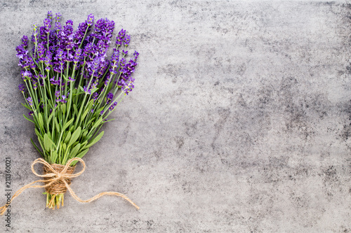 Fototapeta Naklejka Na Ścianę i Meble -  Lavender flowers, bouquet on rustic background, overhead.