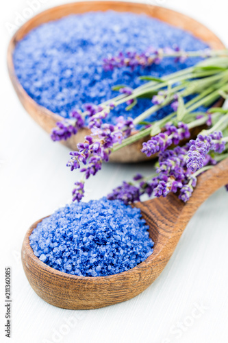 Essential lavender salt with flowers top view.