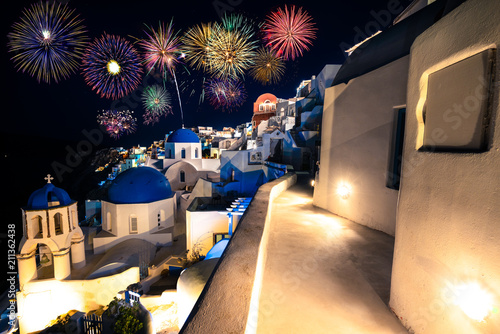 Fototapeta Naklejka Na Ścianę i Meble -  Fireworks display at Oia. Santorini island, Greece