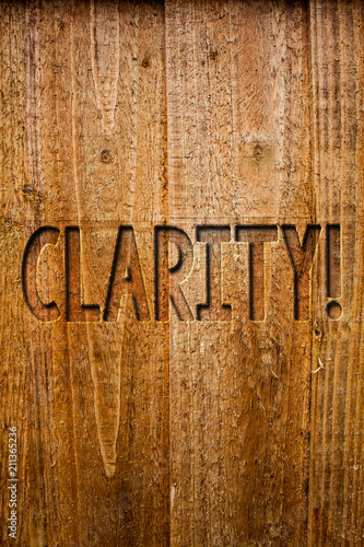 Text sign showing Clarity. Conceptual photo Certainty Precision Purity Comprehensibility Transparency Accuracy Ideas messages wooden background intentions feelings thoughts communicate. photo