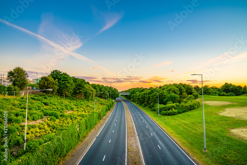 Фотография Empty dual carriage road at sunrise