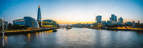 London Cityscape panorama at sunset, seen from Tower Bridge