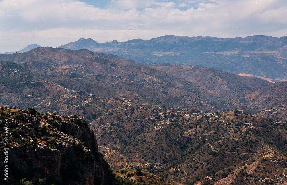 beautiful view of the mountains in the region of Andalusia, houses and farmland on the slopes of mountains beautiful view of the mountains in the region of Andalusia, houses and farmland on the slopes of mountains