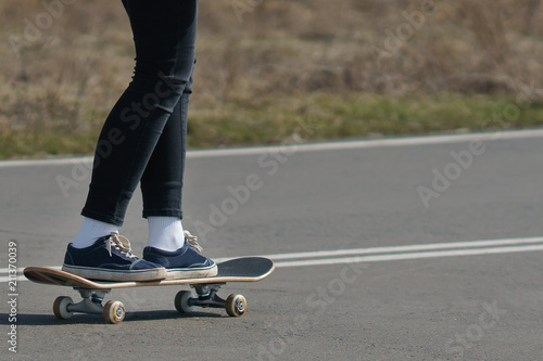 man riding a skateboard in good weather
