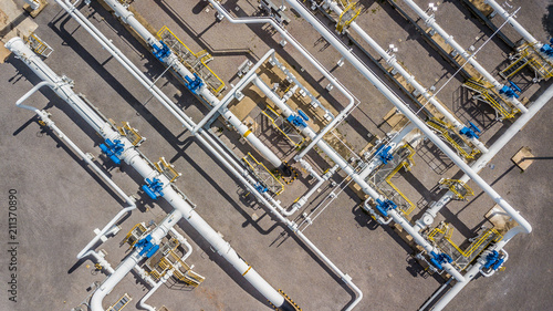 Aerial top view natural gas pipeline, Business gas industry, Construction gas transport system, stop valves bolt and appliances for gas pumping station capacity chemical. photo
