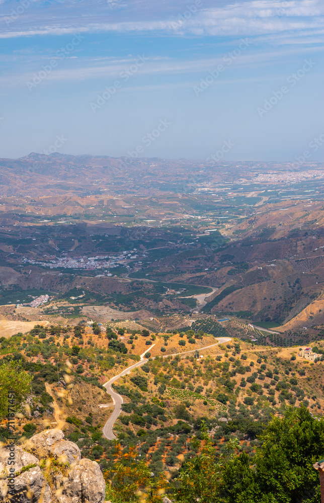 beautiful view of the mountains in the region of Andalusia, houses and farmland on the slopes of mountains beautiful view of the mountains in the region of Andalusia, houses and farmland on the slopes of mountains