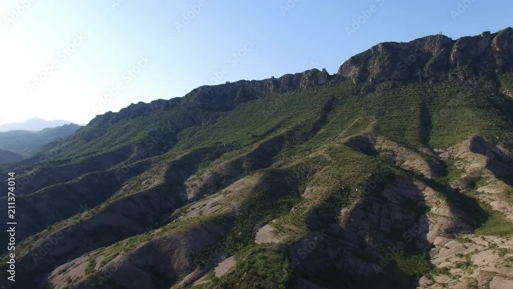 Aerial view of the green mountain with Simatai Great Wall in Beijing, China