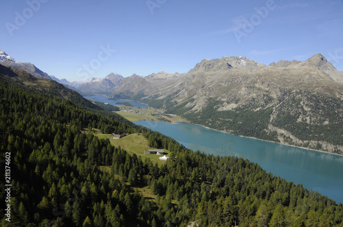 Magnificant swiss alp panoramic view from mount Corvatsch to the glacier lakes of the valley of Oberengadin
