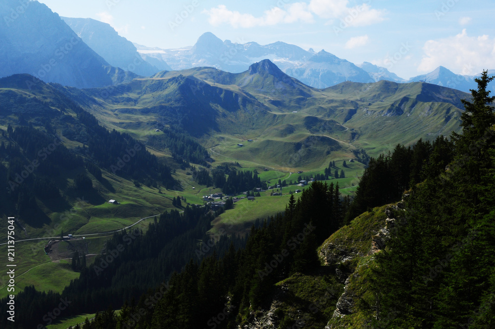 Swiss alps: mountain landscape, lush green hills in Adelboden/Silleren, Bernese Oberland