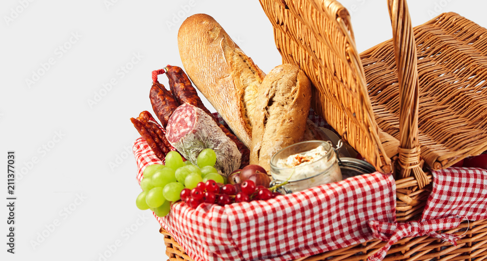 Spicy sausages, fresh fruit and baguettes