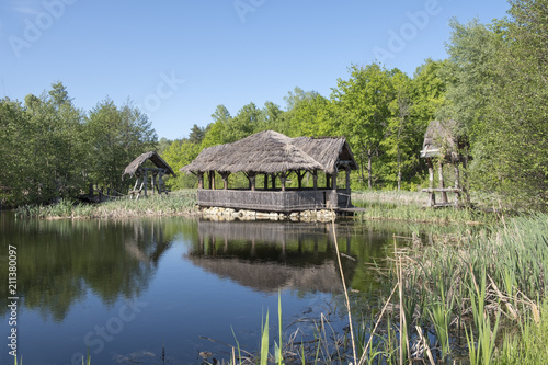 hut on stilts on the water © kodrjan