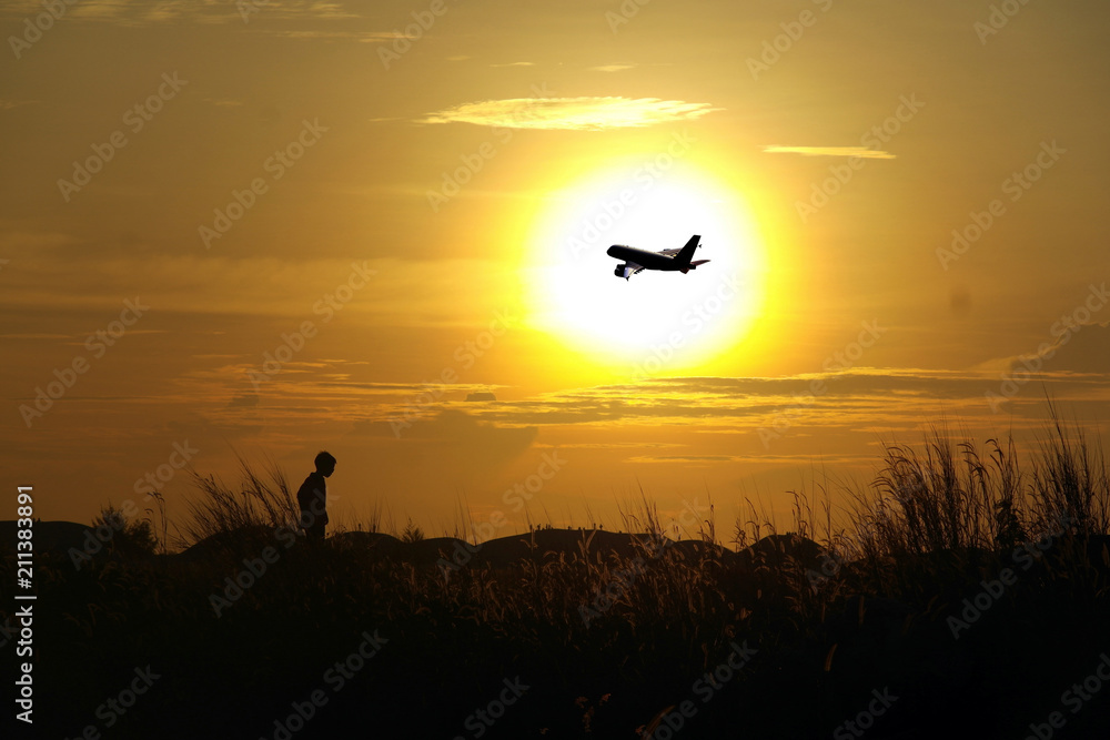 Sunset and Plane