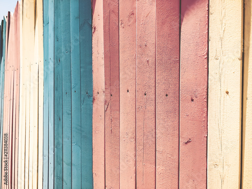 Colored texture of wooden dry fence boards © Victoria Key