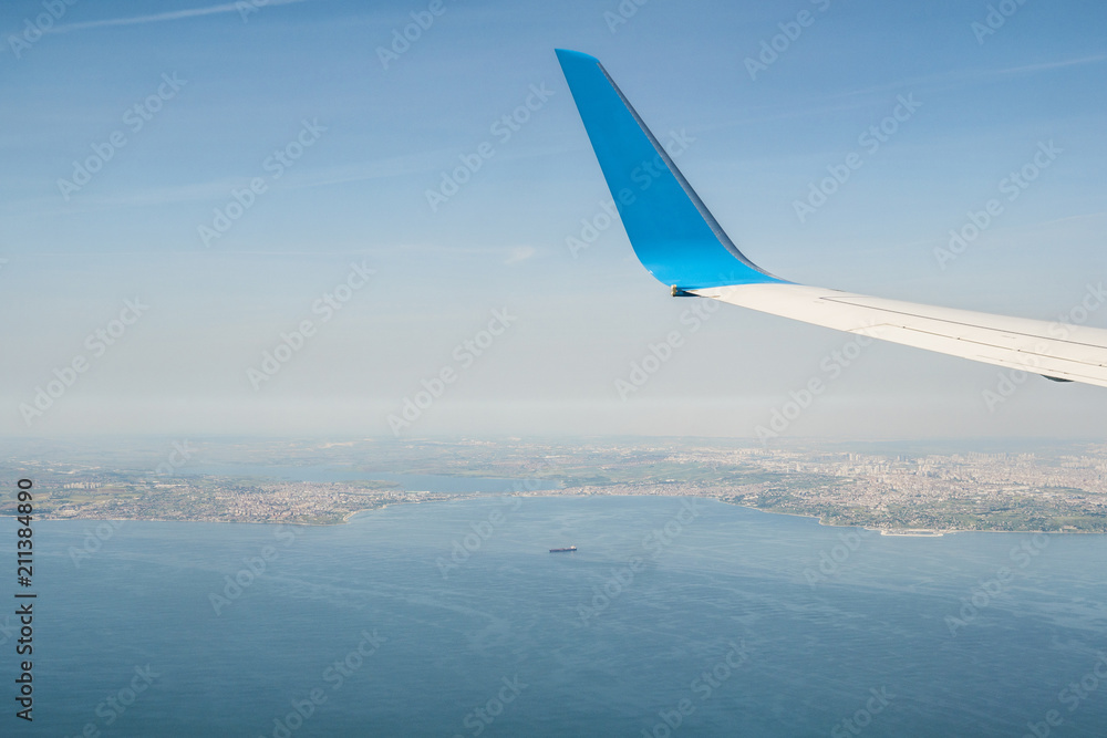 Obraz premium Aerial view of sky from aircraft window.