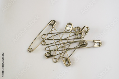 Large Aluminum Brooch On a white background Used for stitching together fabric. Without sewing