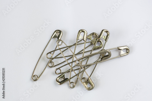 Large Aluminum Brooch On a white background Used for stitching together fabric. Without sewing