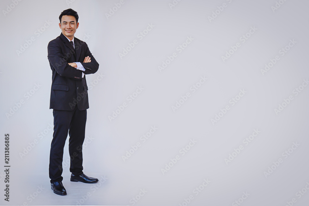 Happy businessman, handsome man standing Happy businessman, handsome man standing
