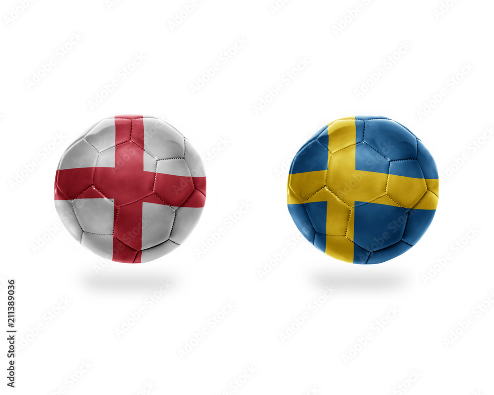 Obraz premium football balls with national flags of england and sweden.