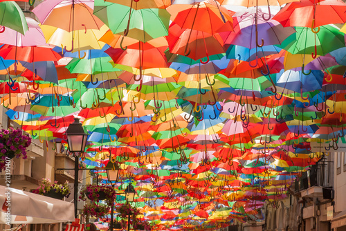 A street covered with umbrellas photo