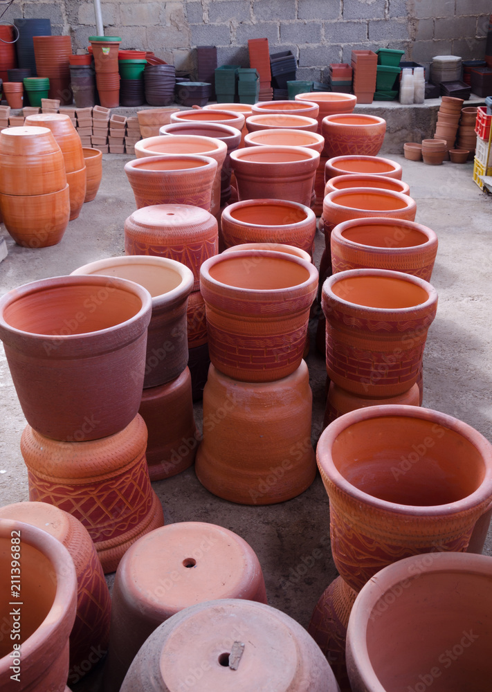 Terracota plant pots in greenhouse for sale Terracota plant pots in greenhouse for sale