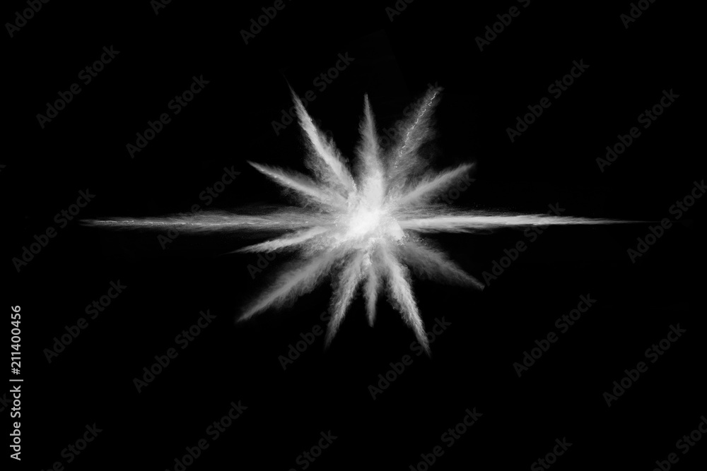Fototapeta premium Launched white powder, isolated on black background.