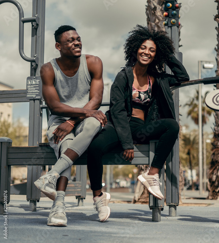 Young happy black couple outdoors