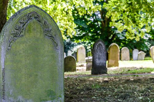 View of several tombstones in a small cemetery in the United Kingdom